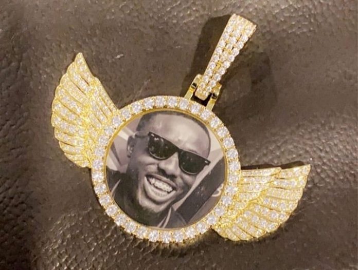 Medikal wears expensive necklace engraved with Criss Waddle’s face